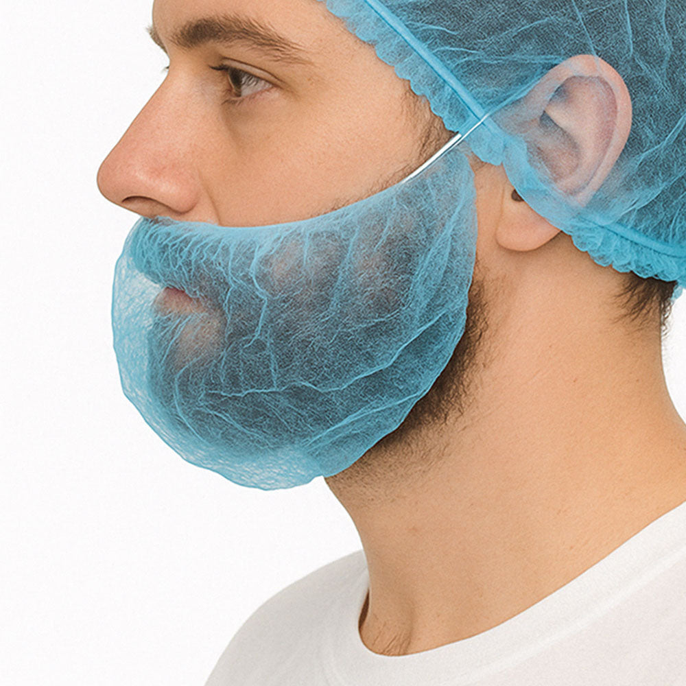 Person wearing a blue hairnet over their head and beard on a white background