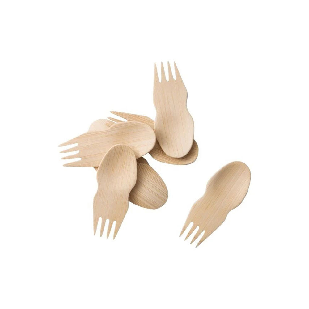 Set of wooden forks and spoons on a white background