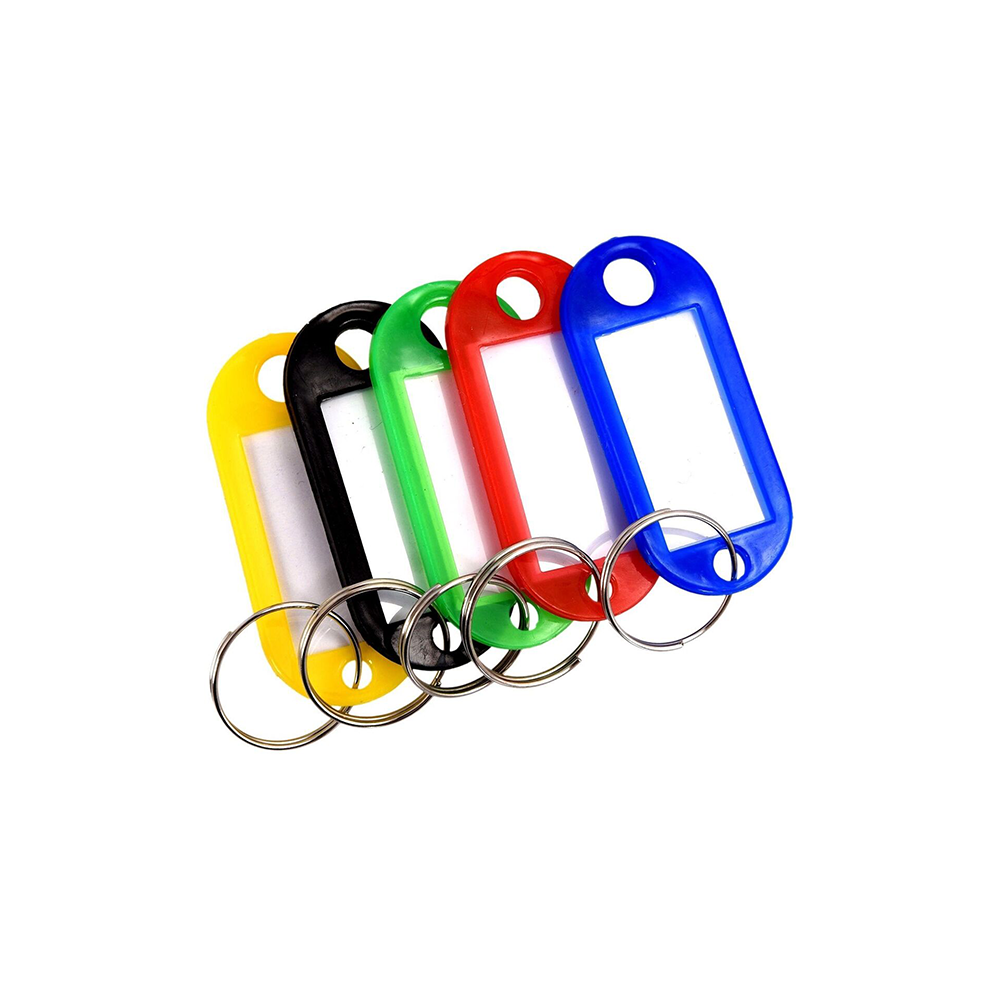 Five colorful keychains with clear tags on a white background